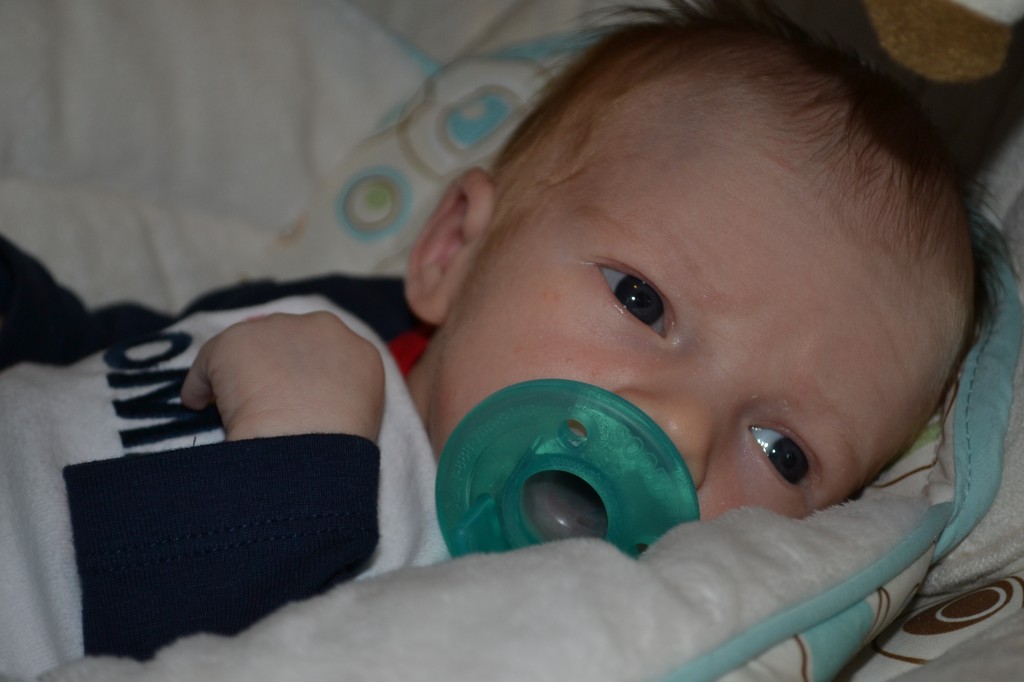 Newborn baby with binkie