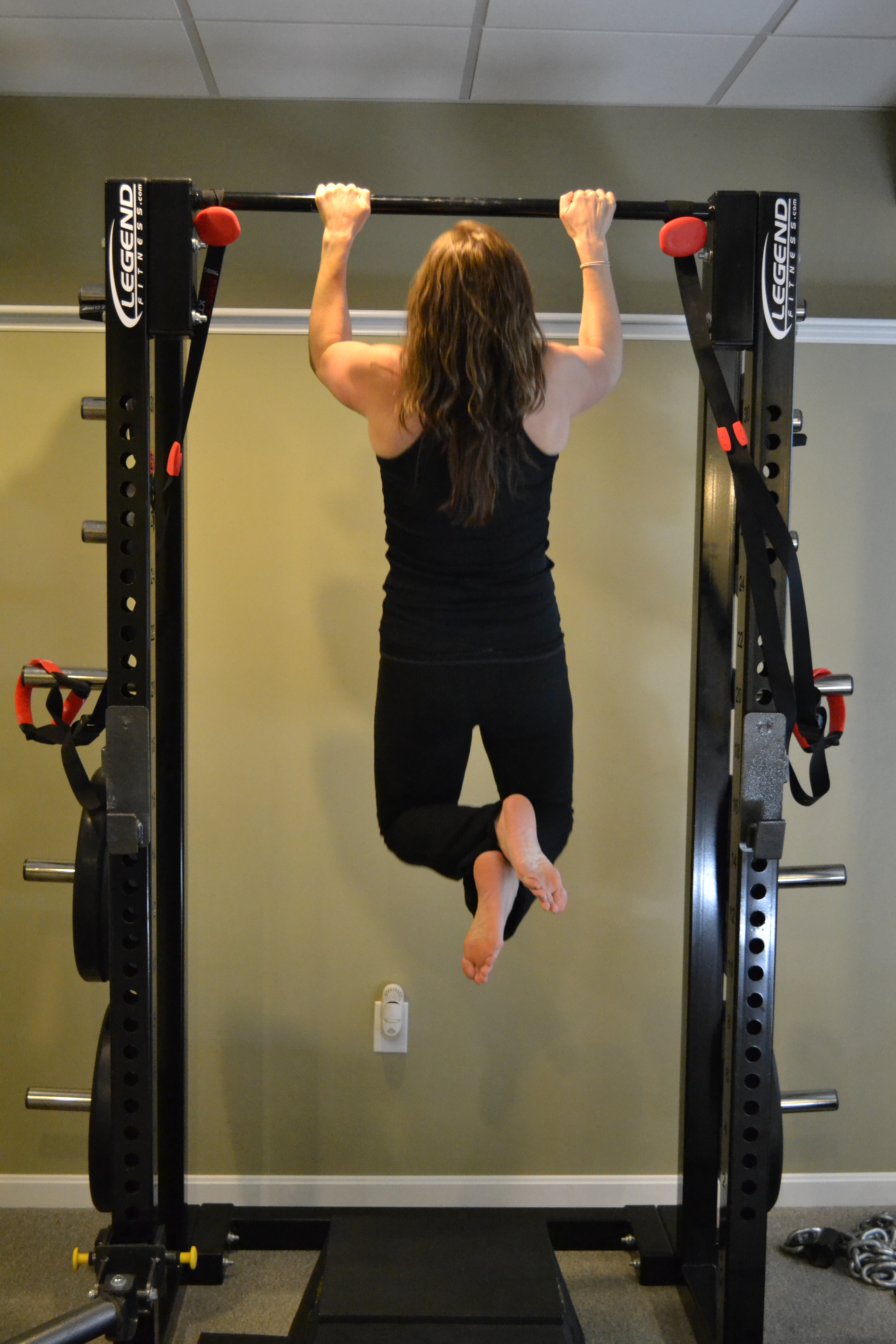 Woman doing pullups