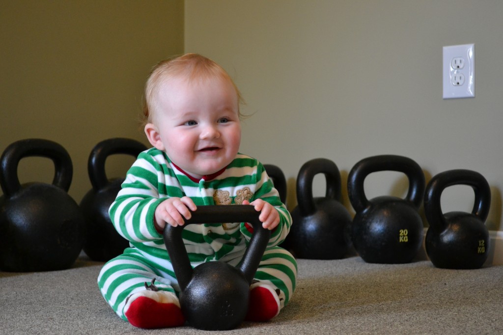 baby with kettlebell