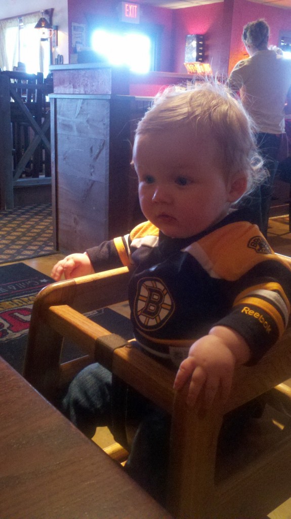 Baby in Bruins Jersey at Restaurant