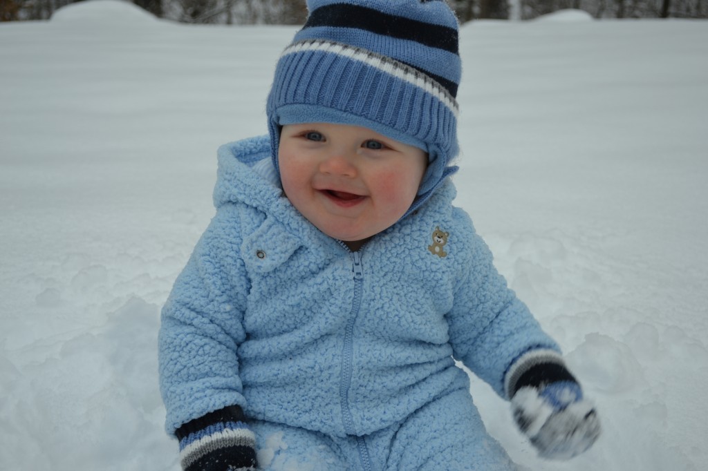Baby Smiling in the Snow