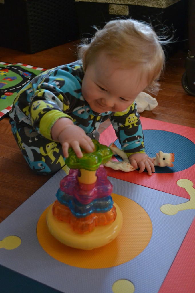 Baby Playing with Colored Blocks
