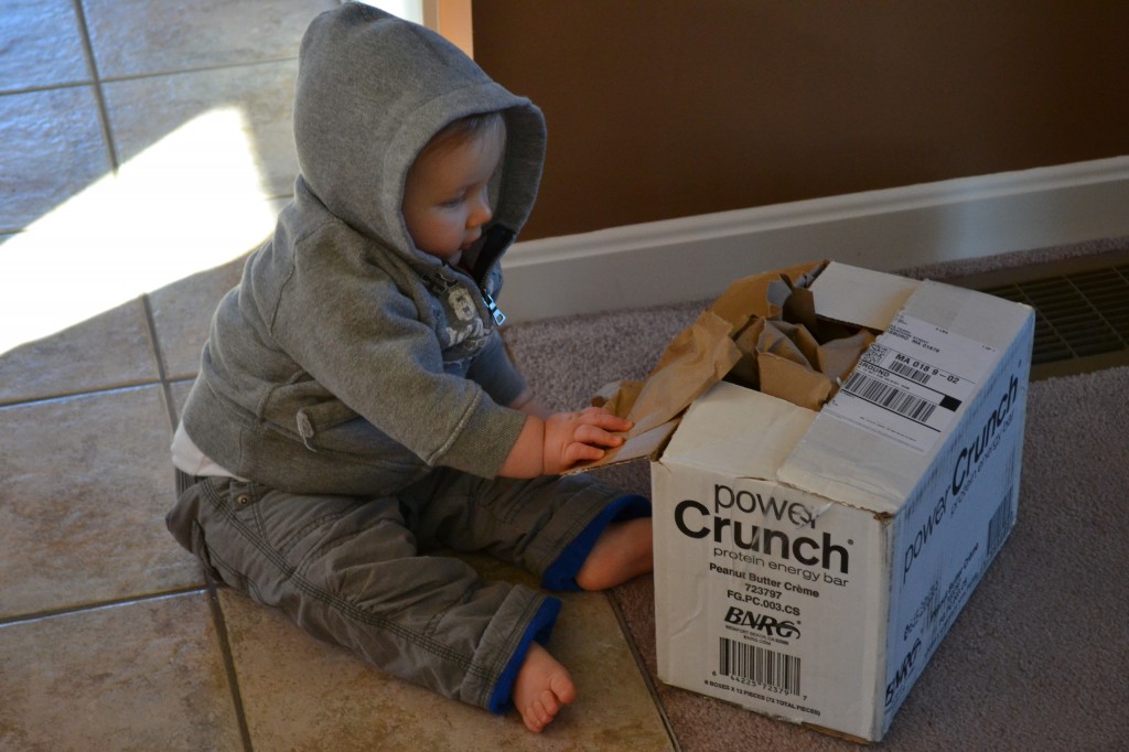 Baby Boy Plays with Box