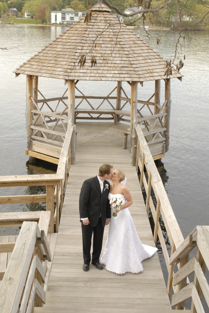 Bride and Groom Kissing on Dock