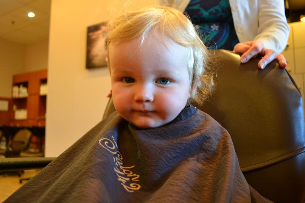 Baby in Chair for First Haircut