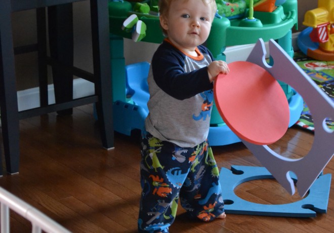 Baby Playing with Floor Tiles