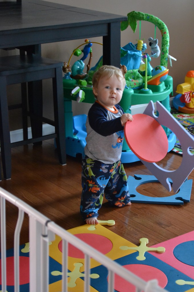 Baby Playing with Floor Tiles