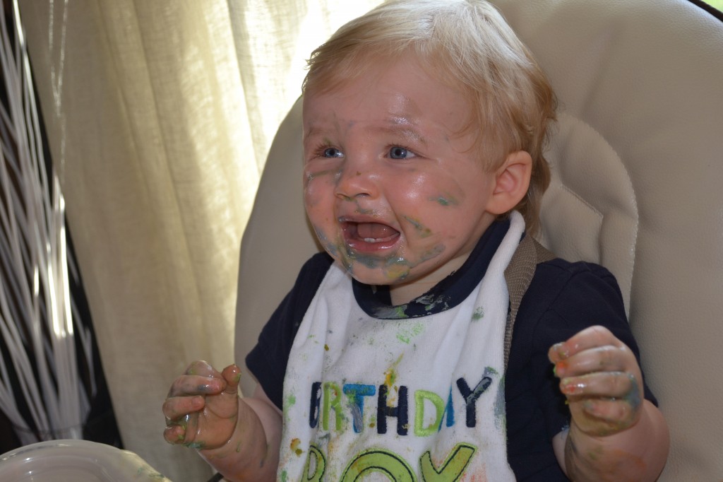 Baby Boy with Frosting All Over Face