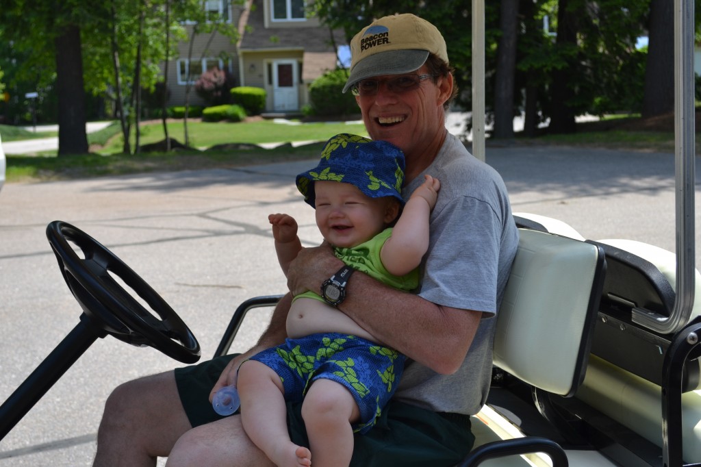 Grandfather with Baby Boy on Golf Cart