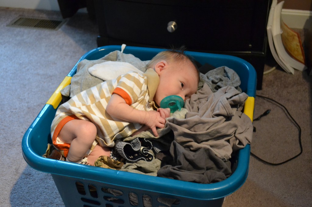 Baby with Laundry in Basket
