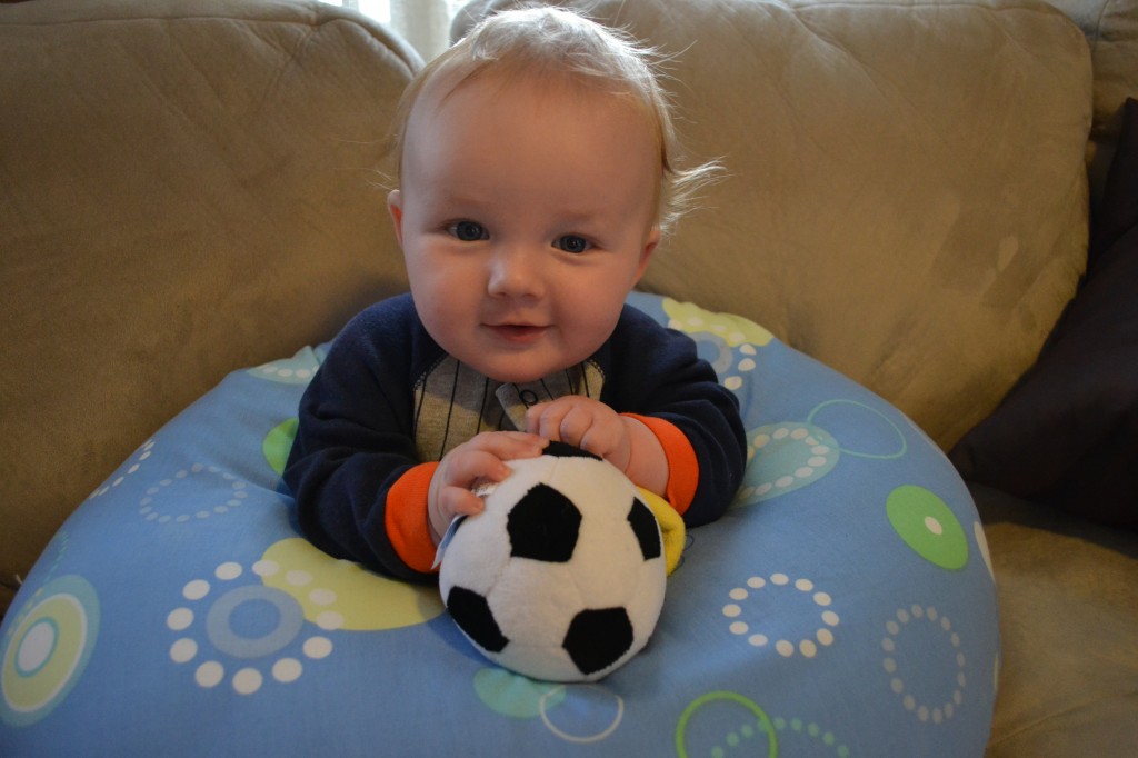 Baby Boy Holding Soccer Ball