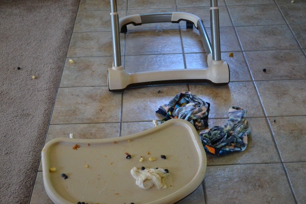 Cleaning High Chair After Breakfast