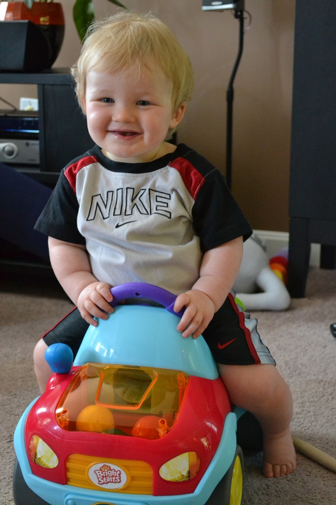 One Year Old Baby Boy on Ride On Car Toy