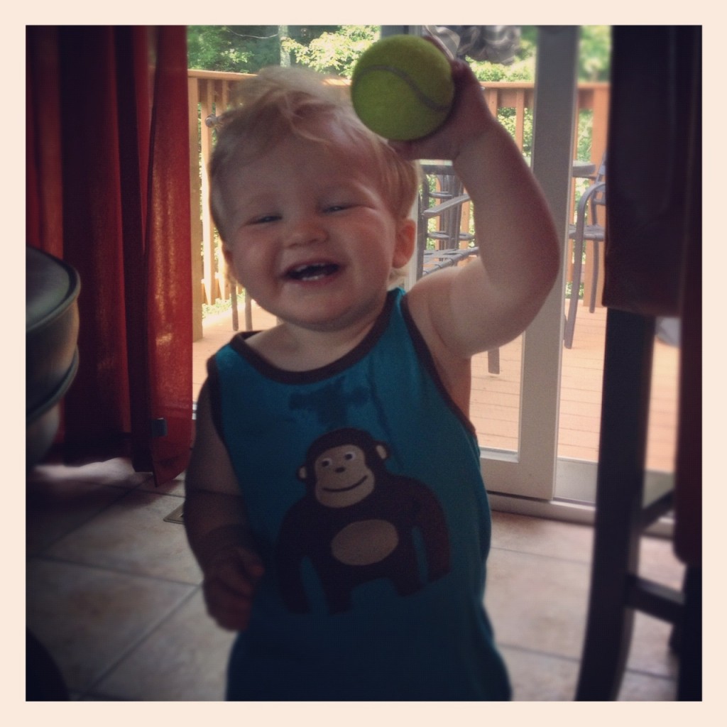 One Year Old Baby with Tennis Ball