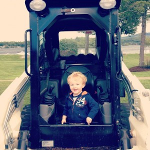 Toddler on Bobcat on Vacation