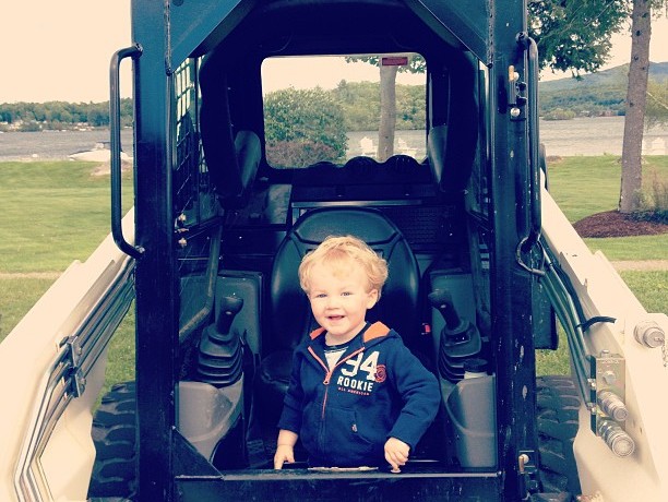 Toddler on Bobcat on Vacation