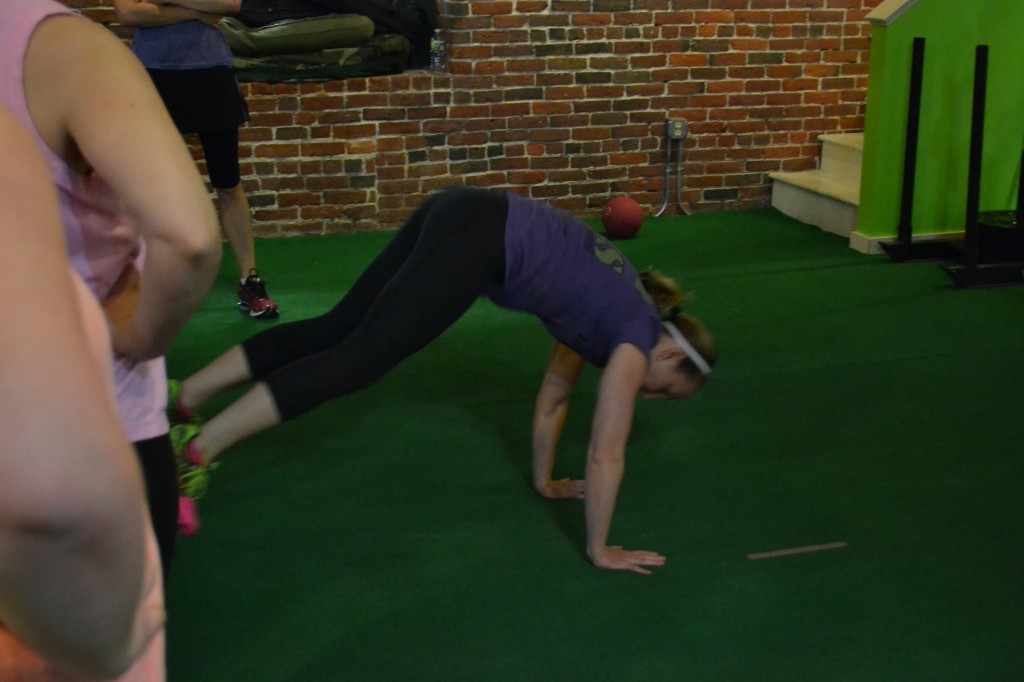 Teaching burpees at ladies night at Skill of Strength