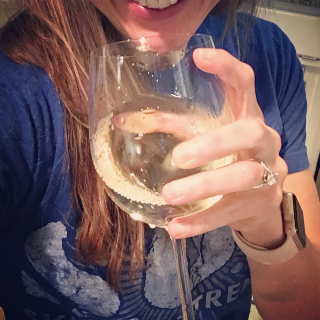 Fitness professionals drink wine